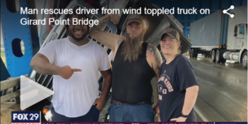 Helping Hands: Dr. Adam Strohl and Wysem Irby Rescue Driver on Girard Point Bridge